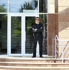 Male security guard outdoors