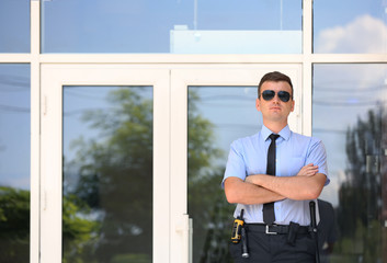 Male security guard outdoors