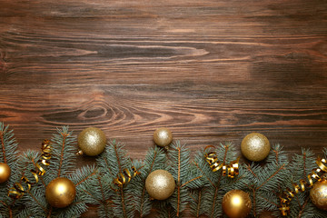 Christmas fir tree on wooden background