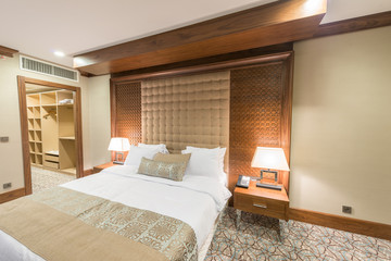 Modern hotel room with big bed