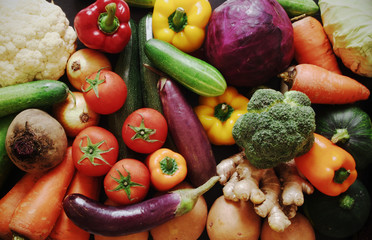 Many fresh vegetables as background, assortment of raw vegetables close up