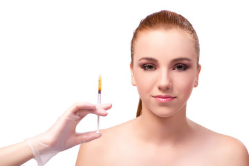 Young woman preparing for facial treatment isolated on white