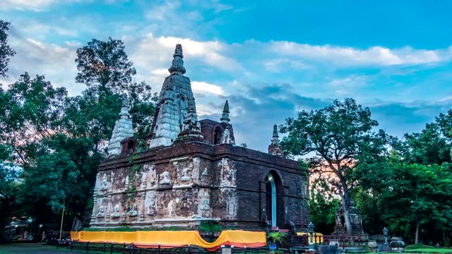 4K,Time lapse day to night, Pagoda at Ched Yod temple the most famous landmark of Chiang mai province, Thailand.(Pan Camera)