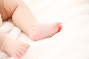 Obraz na płótnie Canvas 赤ちゃんの足