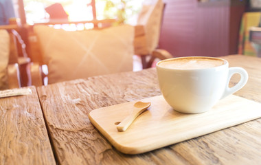 Coffee cup in coffee shop - vintage style effect picture