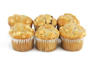 fresh muffins isolated on white background