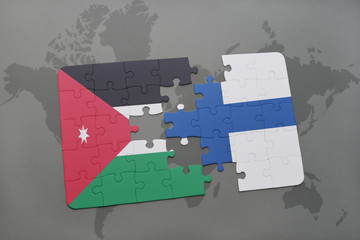 puzzle with the national flag of jordan and finland on a world map background.