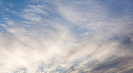 Clouds on background blue sky.