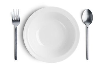White plate with silver fork and spoon with clipping path