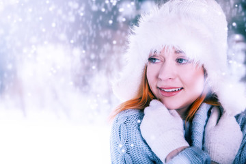Beautifull woman on the winter background