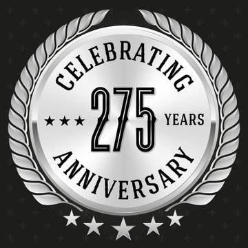 Silver celebrating 275 years badge, button on black background 