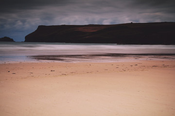 Early morning view of the beach at Polzeath Vintage Retro Filter
