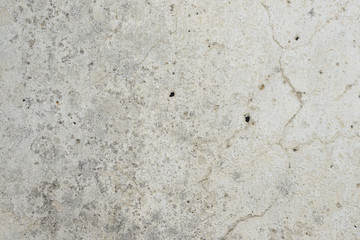 Wall fragment with scratches and cracks