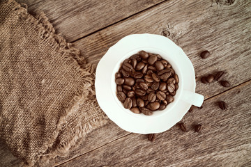 Coffee cup with burlap sack
