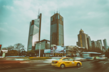 Fototapeta na wymiar blurred street scene in city of China.
