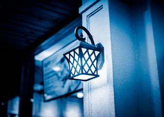 detail shot of antique Street lamp in blue tone.