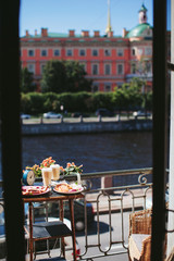 breakfast on the balcony overlooking the city of St. Petersburg