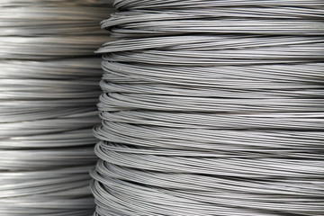 Large coil of Aluminum wire - obrazy, fototapety, plakaty