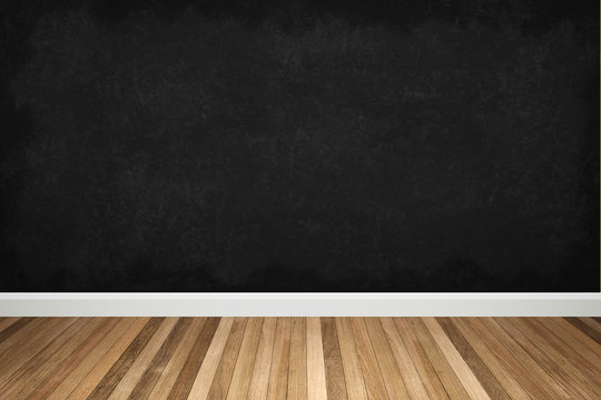 blackboard with wooden frame on wood floor , for background texture with copy space