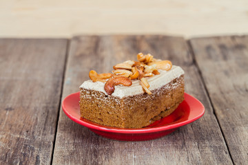 Coffee cake with cashew nut on white background