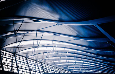 Glass roof of modern building in blue tone.