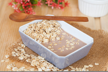 oat flakes mix with chocolate milk in blow