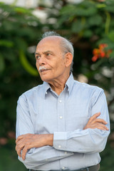 Senior Indian man looking away