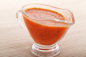 Lemon and tomatoes salad dressing. Horizontal shot
