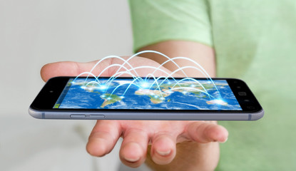 Businessman holding mobile phone with internet connection 3D ren
