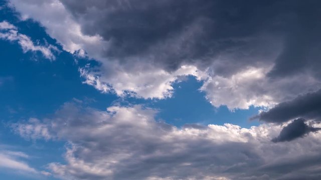 Moving clouds on sky. Sunset. Nature background. Timelapse.