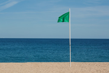 Green beach safety flag