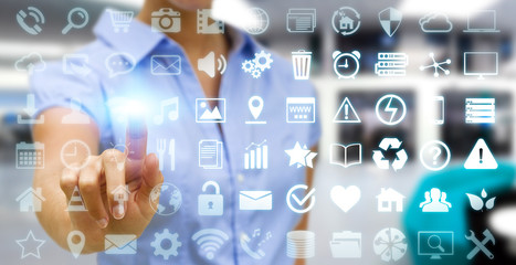 Businesswoman using digital tactile screen interface with web ic