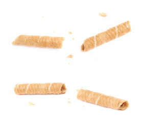 Broken into pieces wafel sticks isolated over the white background