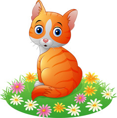 Obraz na płótnie Canvas Cartoon cat sitting on the grass
