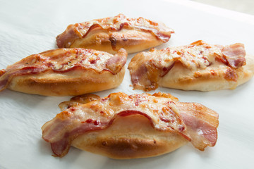  bacon and mozzarella  cheese on bread