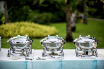 Buffet Table with Row of Food Service Steam Pans
