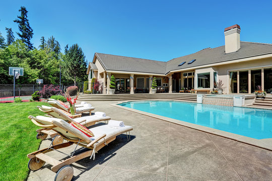 Great Backyard With Swimming Pool .American Suburban Luxury House