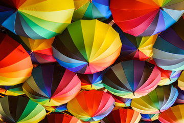 colorful umbrellas hanging from ceiling