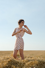 girl in a field on the Seine