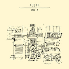 Naklejka premium Old historic building and a cart in Main Bazar, Paharganj, New Delhi, India. Artistic handdrawn vintage touristic postcard