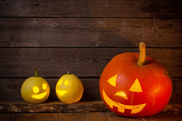 pumpkins on wooden background with copy space