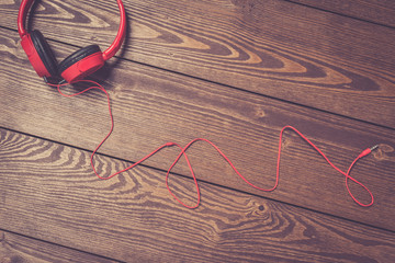Headphones on an old wooden table