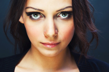 Fototapeta premium Young woman with beautiful eyes