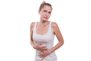 Young woman is having stomach ache