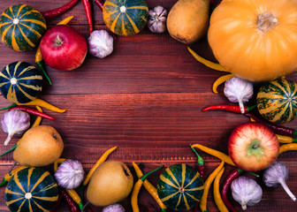Fresh organic vegetables on wooden background, autumn concept