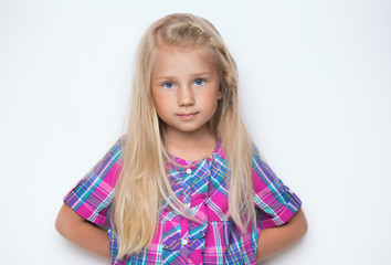 Portrait of a charming blonde little girl