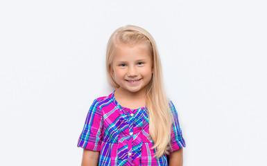 Portrait of a charming blonde little girl