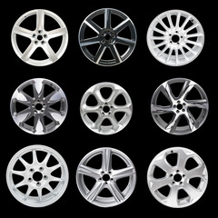 Set of 9 isolated car wheels on black background