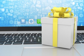 Gift box with ribbon on laptop keyboard. 3d rendering.