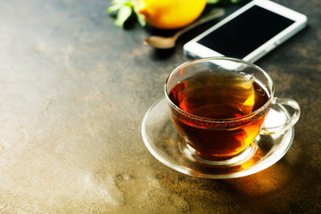 tea and mobile phone